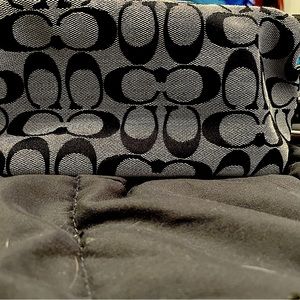 Grey and black coach small hand bag.
